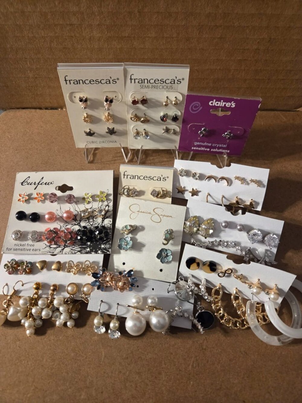 40 sets of misc earrings, mostly studs